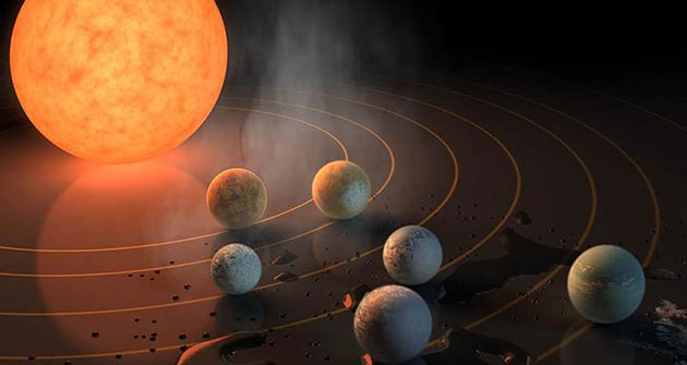 Drei Planeten, die TRAPPIST-1 umkreisen, befinden sich in der klassischen „habitablen Zone“ dieses Sterns (Illu). Copyright: R. Hurt / NASA / JPL-Caltech