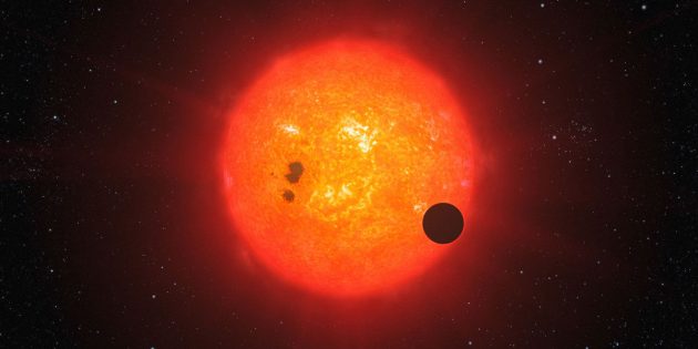 Symbolbild: Künstlerische Darstellung eines Planeten um einen Roten Zwergstern (Illu.). Copyright: ESO/L. Calçada