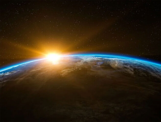Symbolbild: Sonnenaufgang über der Erde. Copyright/Quelle: Pixabay.com / Pixabay License